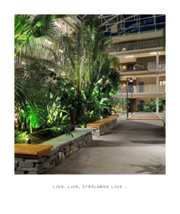 Europaljus - En hall med växter och träd i bakgrunden, upplyst av lampor från Europaljus-belysning.