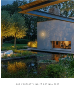 Europaljus - Ett hus med en damm i mitten